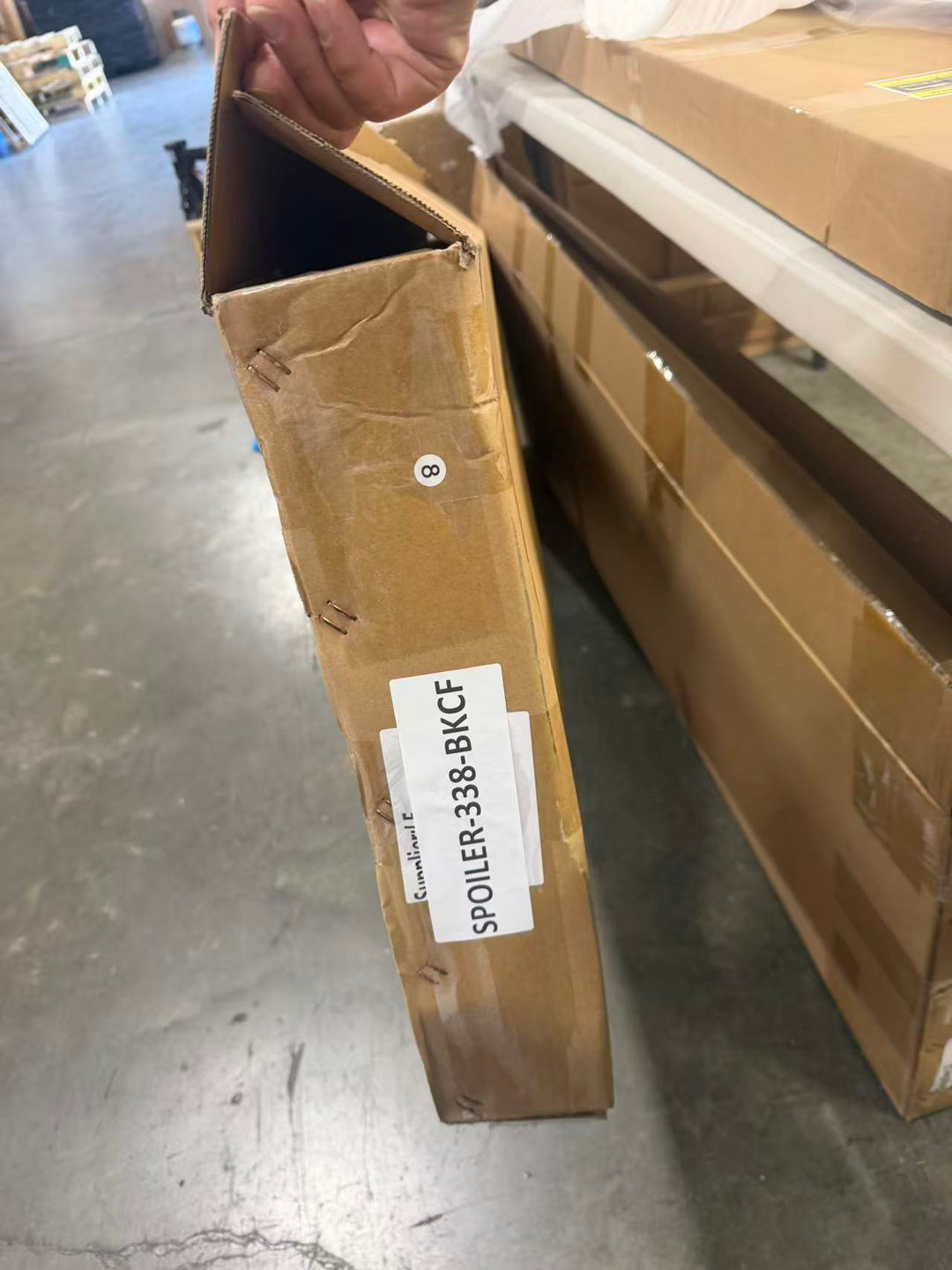 Actual outlet unit SPOILER-338-BKCF-C-51 - shipping box, second view