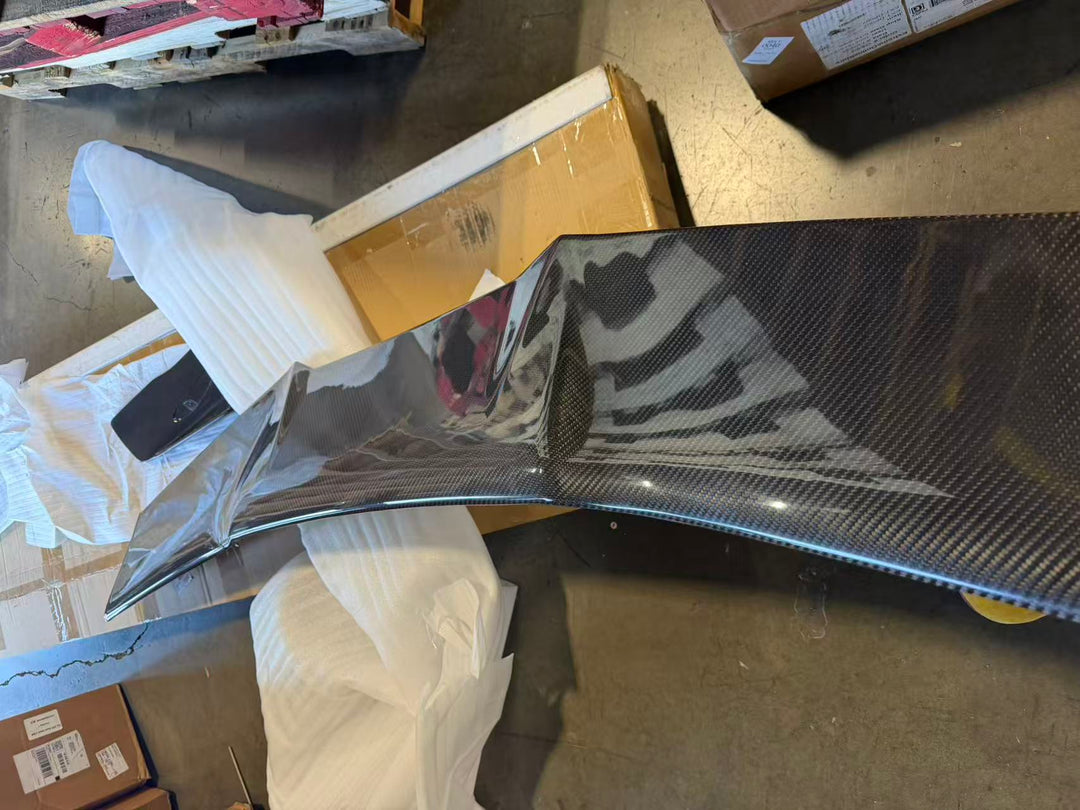 Actual outlet unit SPOILER-717-BKCF-C-49 - full view of the dry carbon rear wing as received