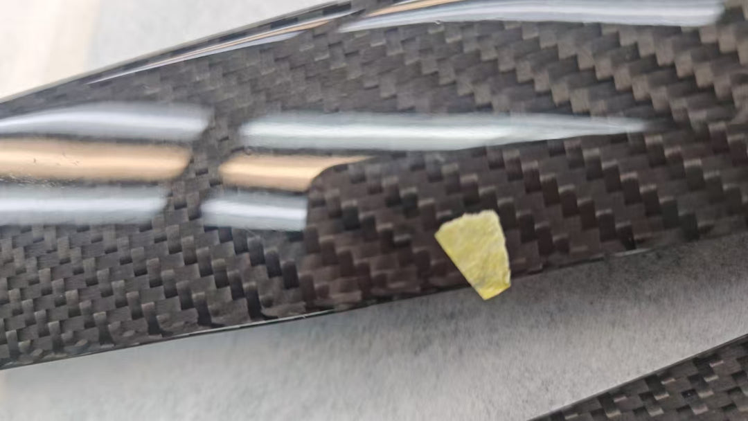 Actual outlet unit SPOILER-428-BKCF-C-1 - marked defect close-up