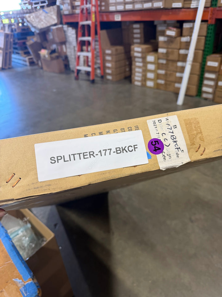 Actual outlet unit SPOILER-177-BKCF-C-54 - shipping box with item label as received
