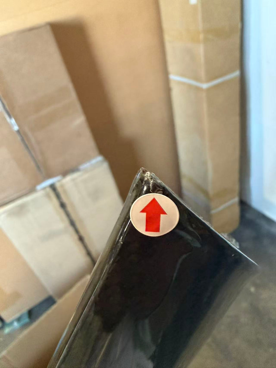 Actual outlet unit SPOILER-717-BKCF-C-49 - close-up of corner defect, still bagged