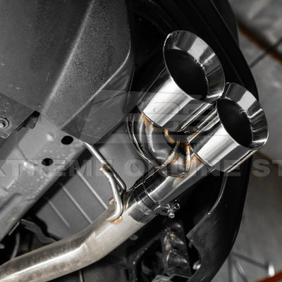 2024 Ford Mustang GT muffler delete axle-back exhaust system with quad burnt tips installed on rear bumper