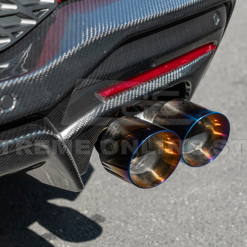 2024 Ford Mustang GT muffler delete axle-back exhaust system with quad burnt tips installed on rear bumper