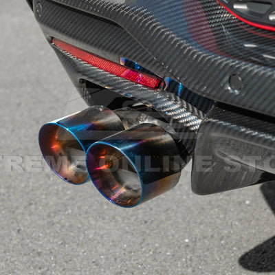 2024 Ford Mustang GT muffler delete axle-back exhaust system with quad burnt tips installed on rear bumper