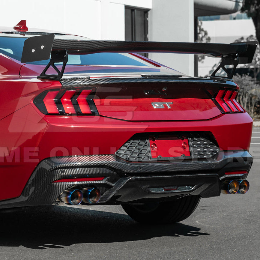 2024 Ford Mustang GT muffler delete axle-back exhaust system with quad burnt tips installed on rear bumper