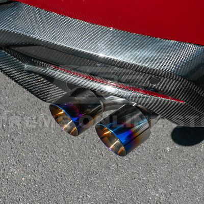2024 Ford Mustang GT muffler delete axle-back exhaust system with quad burnt tips installed on rear bumper