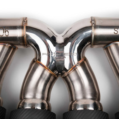 2023 Chevrolet Corvette C8 Z06 SuperSport X-Pipe Cat-Back Exhaust System installed in shop, showcasing premium craftsmanship and performance design.