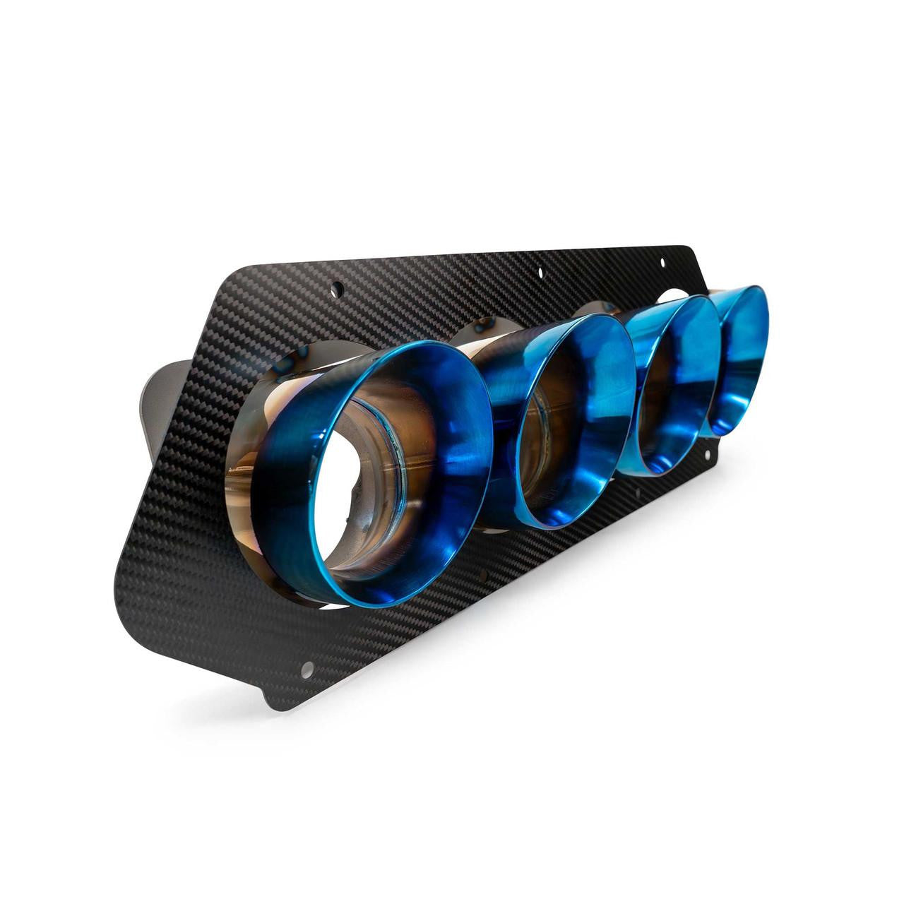 Detailed close-up of the 2023 Chevrolet Corvette C8 Z06 ZR1 titanium quad exhaust tips, highlighting the precision craftsmanship and premium metallic finish.