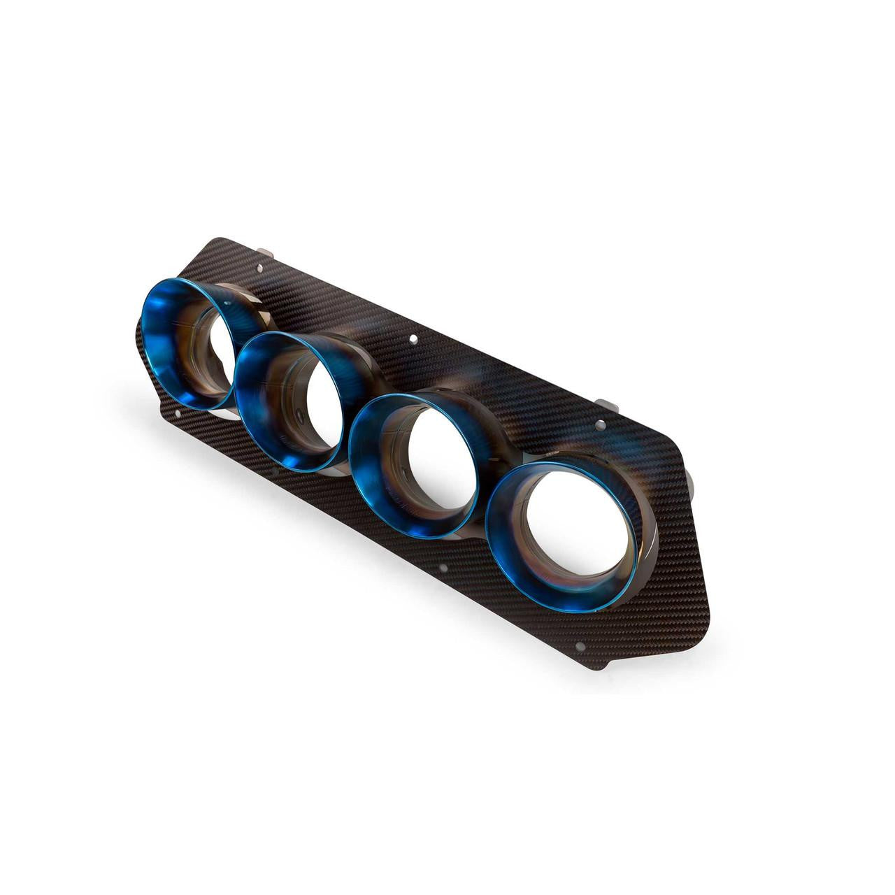 Detailed close-up of the 2023 Chevrolet Corvette C8 Z06 ZR1 titanium quad exhaust tips, highlighting the precision craftsmanship and premium metallic finish.