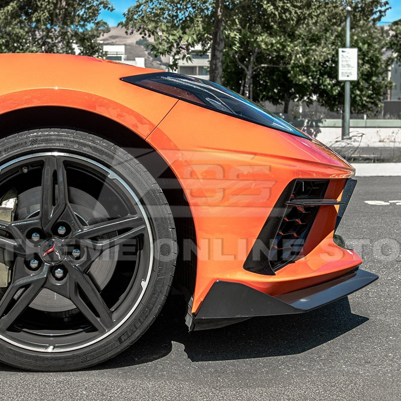 Front splitter ground effect for Corvette C8 stingray with 5VM package, featuring aggressive aerodynamic design and premium factory-style fitment.