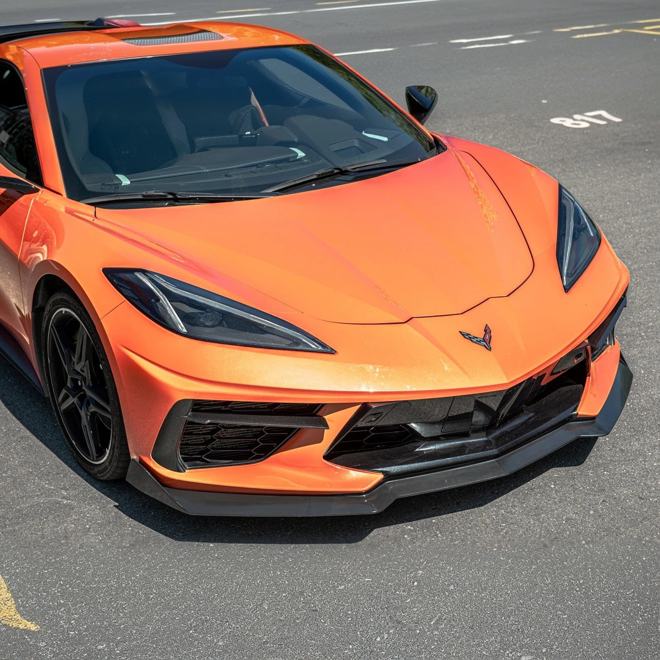 Front splitter ground effect for Corvette C8 with 5VM package, featuring aggressive aerodynamic design and premium factory-style fitment.