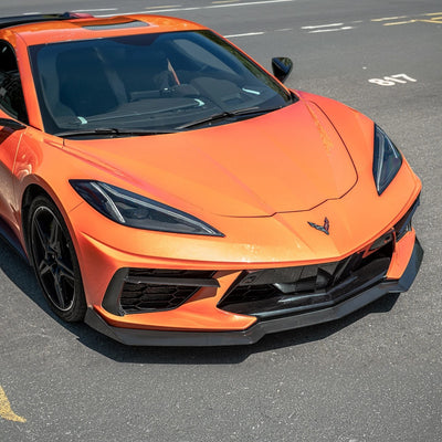 Front splitter ground effect for Corvette C8 with 5VM package, featuring aggressive aerodynamic design and premium factory-style fitment.