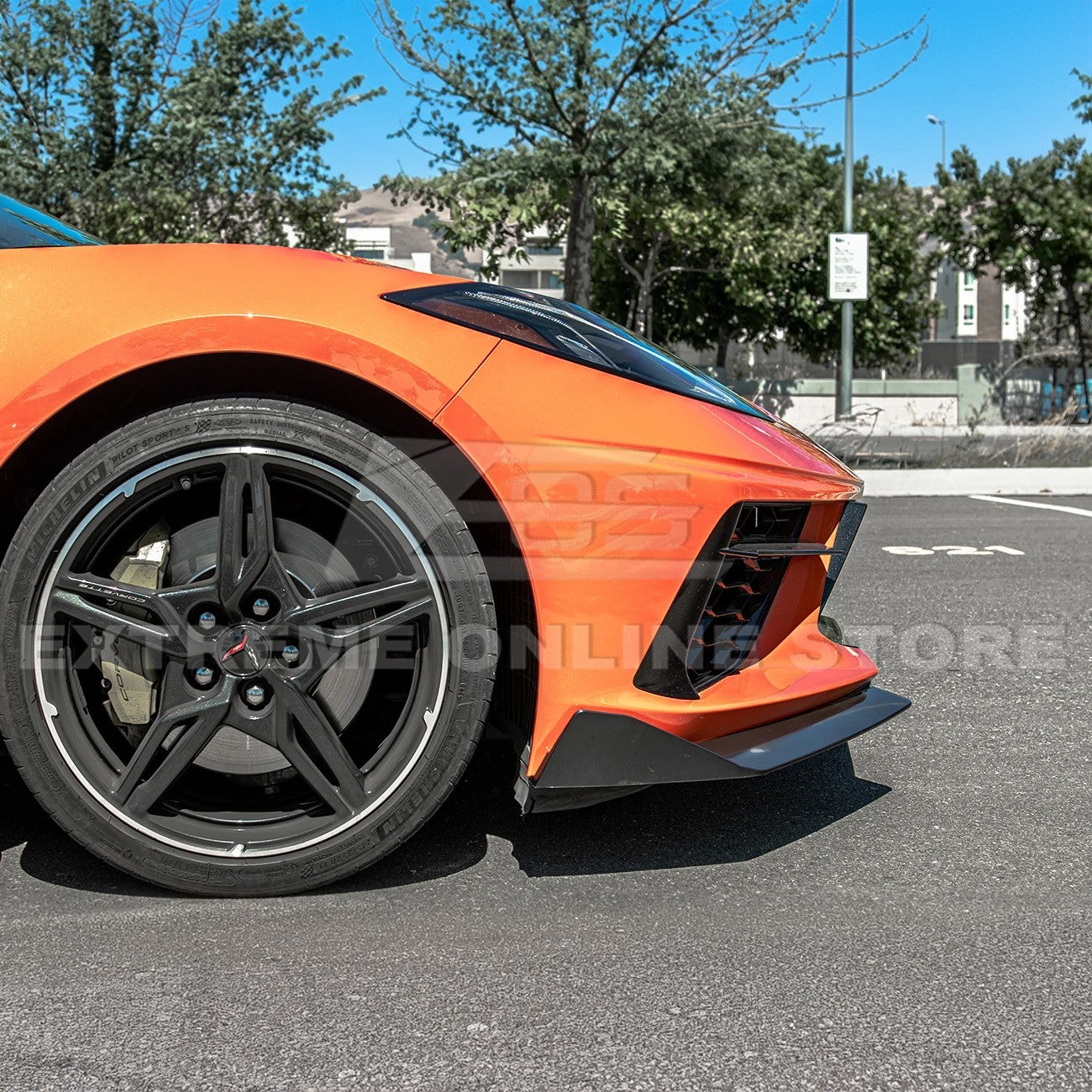 Front splitter ground effect for Corvette C8 with 5VM package, featuring aggressive aerodynamic design and premium factory-style fitment.