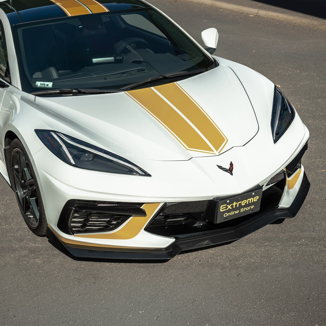 Front splitter ground effect for Corvette C8 with 5VM package, featuring aggressive aerodynamic design and premium factory-style fitment.