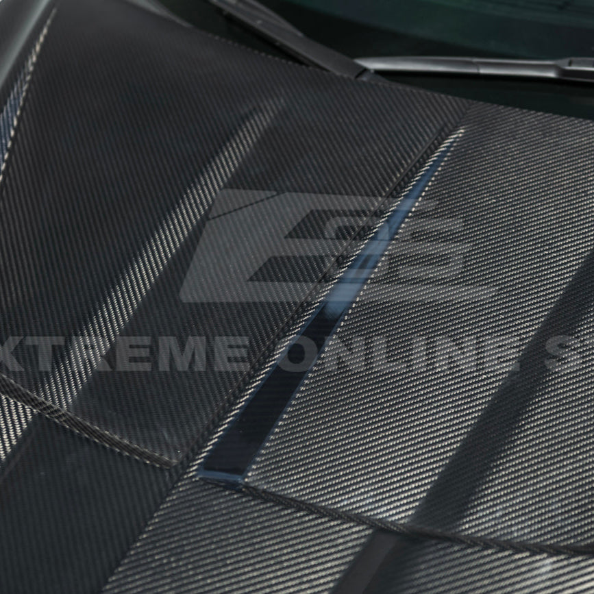 Close-up image of the Corvette C8 EOS Performance Track Style Double-Sided Dry Carbon Fiber Front Hood showing the premium dry carbon weave, lightweight construction, and aggressive aerodynamic design that enhances both performance and style.