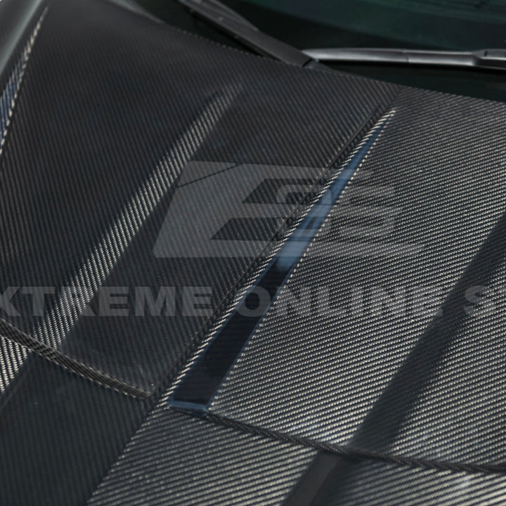 Close-up image of the Corvette C8 EOS Performance Track Style Double-Sided Dry Carbon Fiber Front Hood showing the premium dry carbon weave, lightweight construction, and aggressive aerodynamic design that enhances both performance and style.