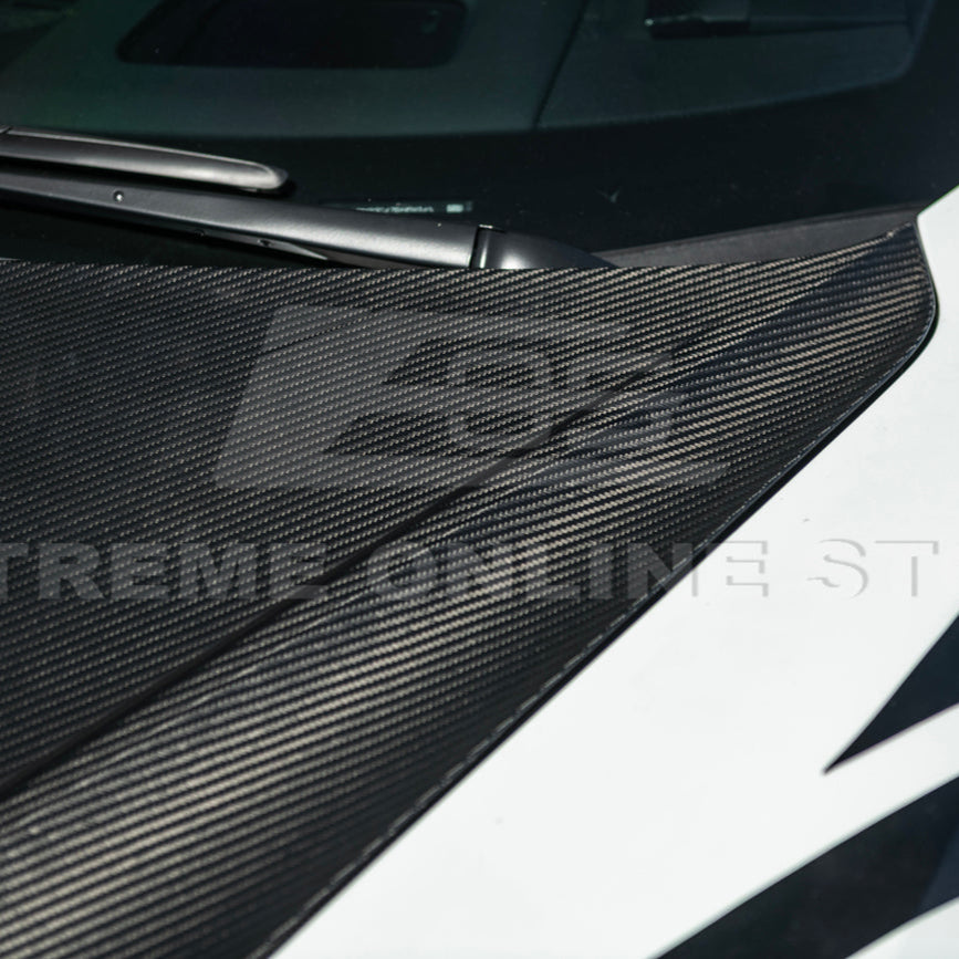 Close-up image of the Corvette C8 EOS Performance Track Style Double-Sided Dry Carbon Fiber Front Hood showing the premium dry carbon weave, lightweight construction, and aggressive aerodynamic design that enhances both performance and style.