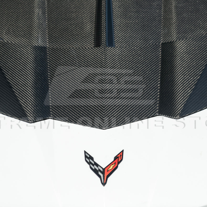Close-up image of the Corvette C8 EOS Performance Track Style Double-Sided Dry Carbon Fiber Front Hood showing the premium dry carbon weave, lightweight construction, and aggressive aerodynamic design that enhances both performance and style.