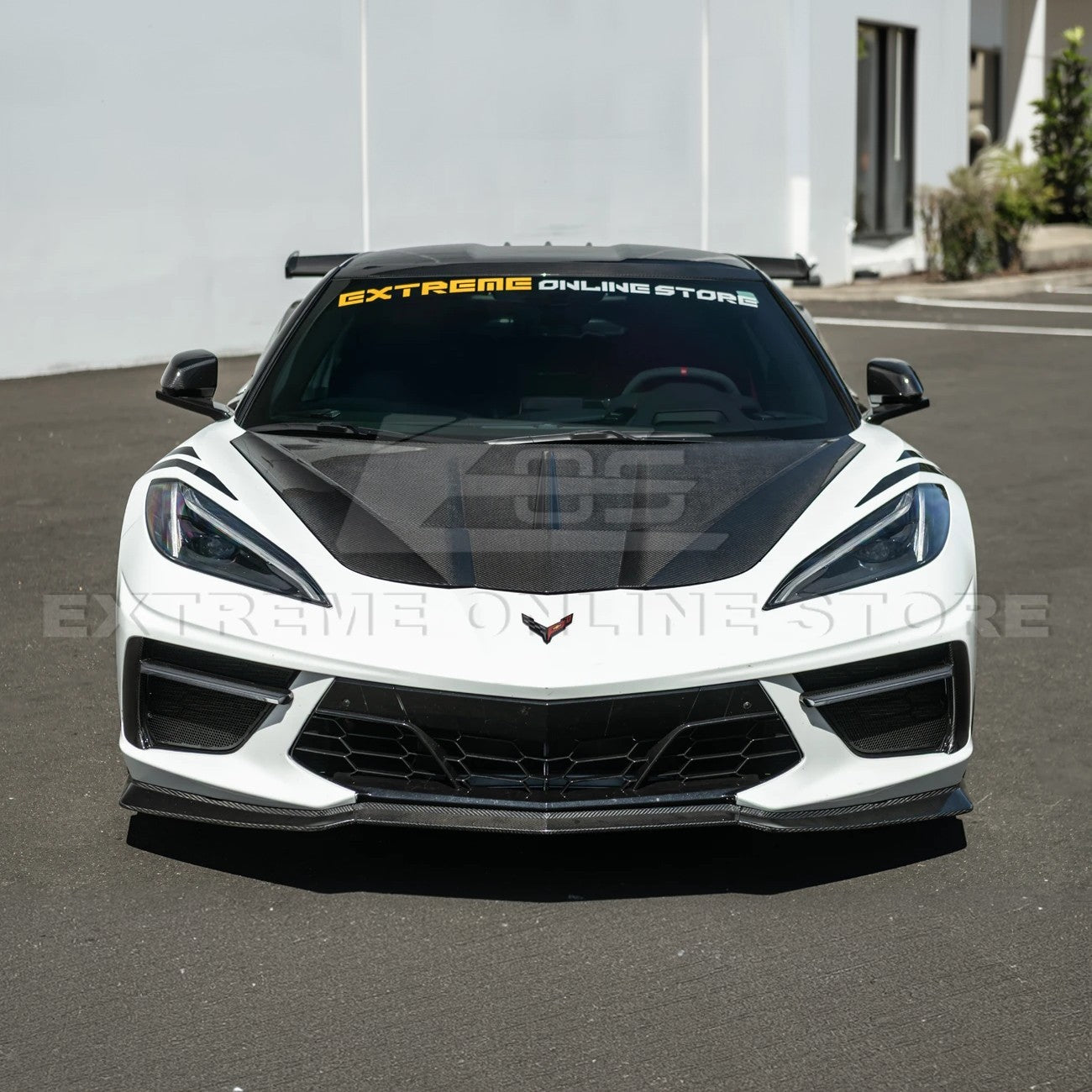 Close-up image of the Corvette C8 EOS Performance Track Style Double-Sided Dry Carbon Fiber Front Hood showing the premium dry carbon weave, lightweight construction, and aggressive aerodynamic design that enhances both performance and style.