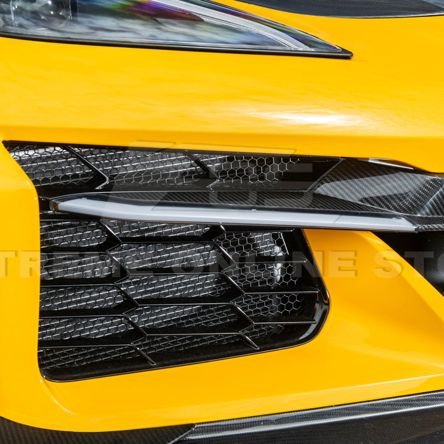 High-quality image of Corvette C8 Z06 Carbon Fiber Sequential LED DRL Light Bar Bezel Insert showcasing the sleek carbon fiber finish and modern LED design that enhances the C8’s front-end style and lighting performance.