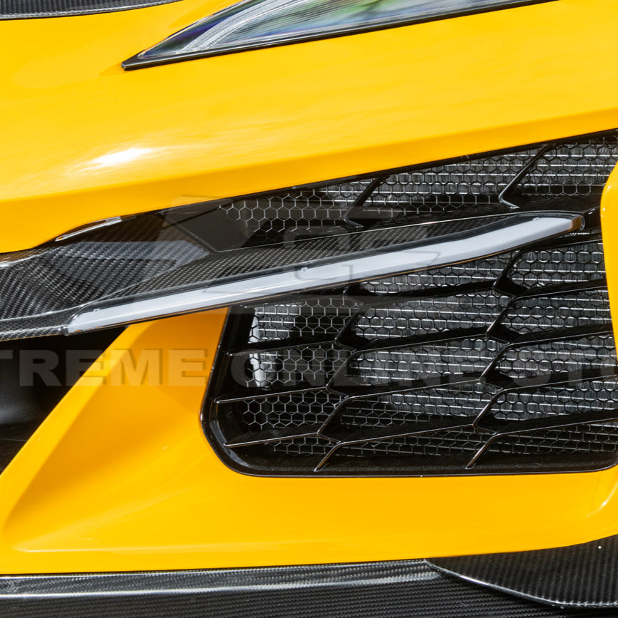 High-quality image of Corvette C8 Z06 Carbon Fiber Sequential LED DRL Light Bar Bezel Insert showcasing the sleek carbon fiber finish and modern LED design that enhances the C8’s front-end style and lighting performance.