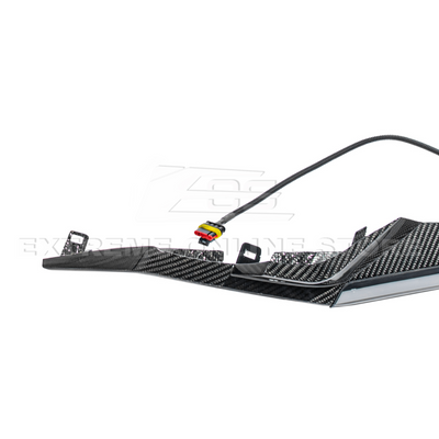 High-quality image of Corvette C8 Z06 Carbon Fiber Sequential LED DRL Light Bar Bezel Insert showcasing the sleek carbon fiber finish and modern LED design that enhances the C8’s front-end style and lighting performance.