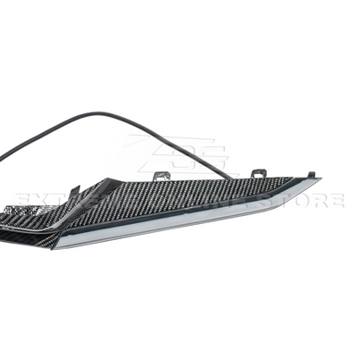 High-quality image of Corvette C8 Z06 Carbon Fiber Sequential LED DRL Light Bar Bezel Insert showcasing the sleek carbon fiber finish and modern LED design that enhances the C8’s front-end style and lighting performance.