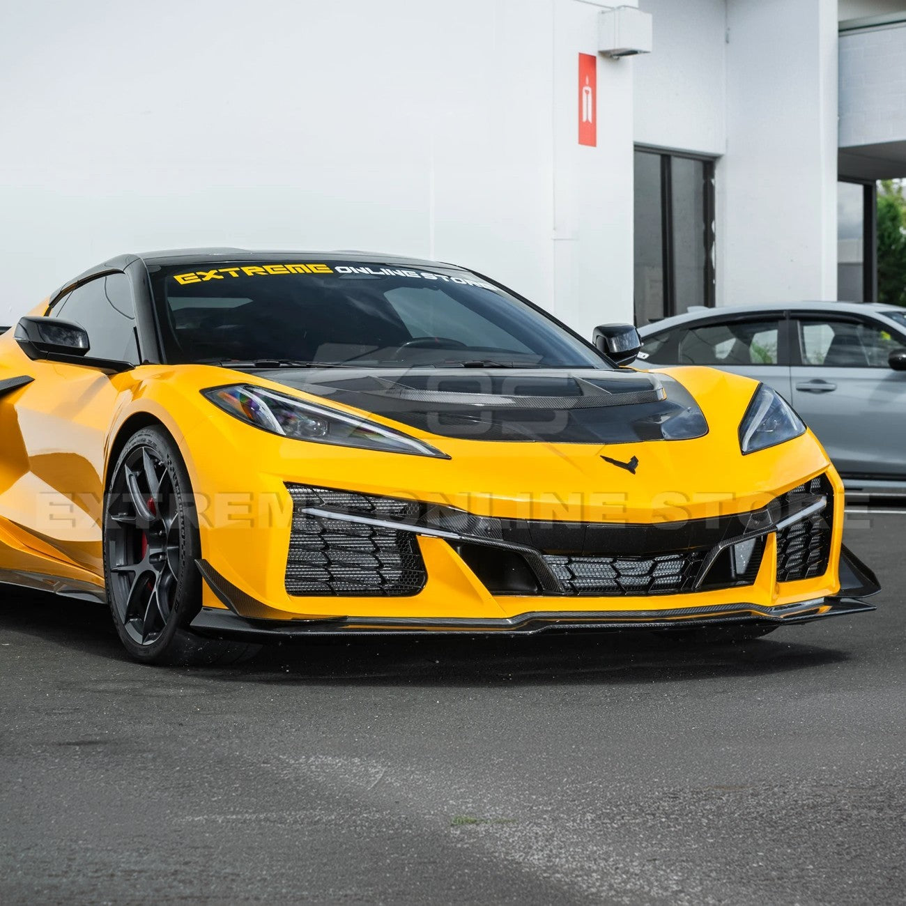 High-quality image of Corvette C8 Z06 Carbon Fiber Sequential LED DRL Light Bar Bezel Insert showcasing the sleek carbon fiber finish and modern LED design that enhances the C8’s front-end style and lighting performance.