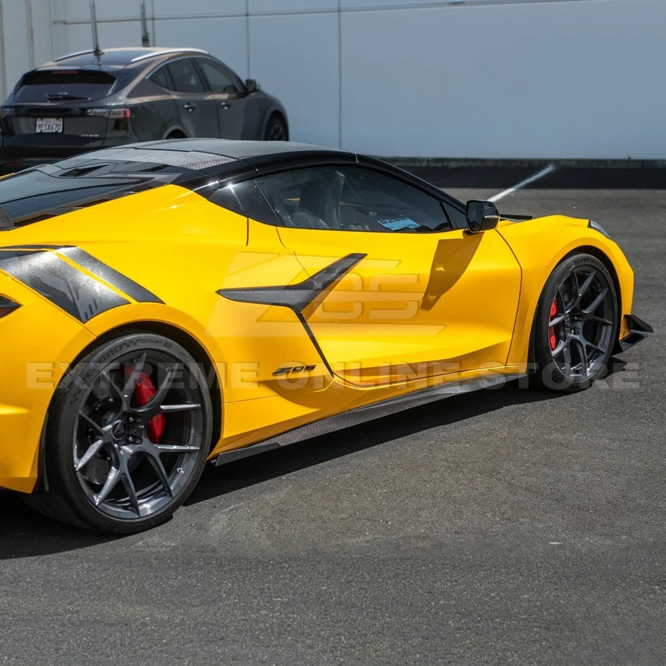 Close-up view of Corvette C8 Z06 EOS Performance Track Style Side Skirts showing carbon fiber design and aerodynamic contour.